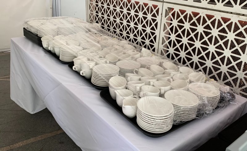 washed crockery on table